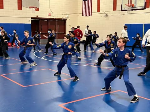 a group of people in a gym