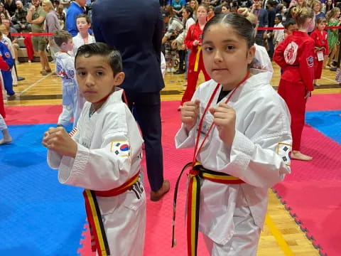 a group of people in karate uniforms