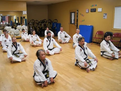 a group of people sitting on the floor