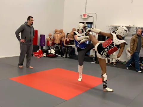 a couple of women in a gym