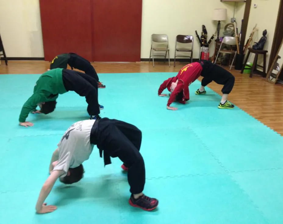 a group of people doing yoga