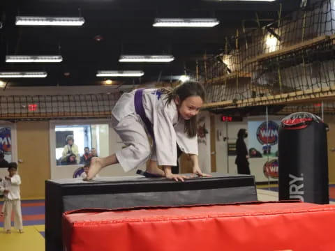 a man doing a trick on a table