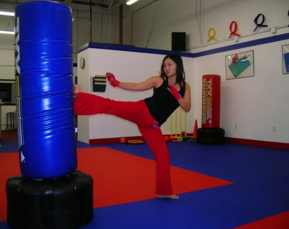 a person posing in a gym