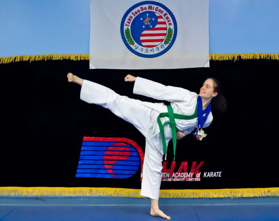 a man in a karate uniform