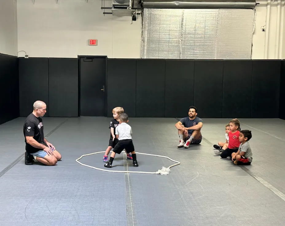 a group of people sitting on the floor