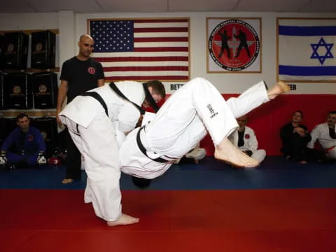 a group of people in a martial arts class