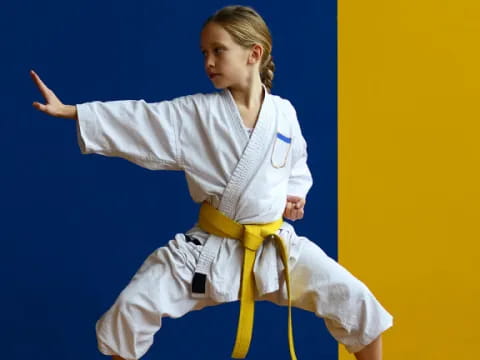 a man in a karate uniform