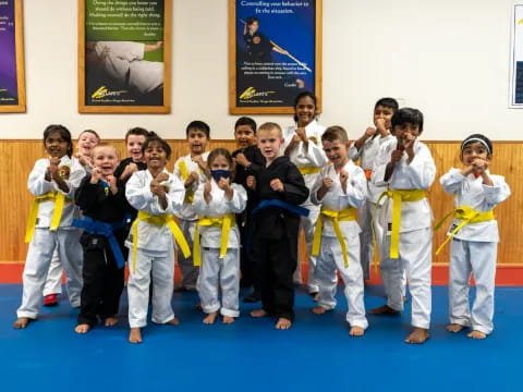 a group of people in karate uniforms