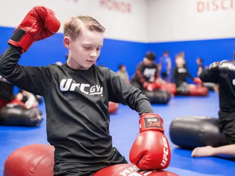 a boy in a boxing ring