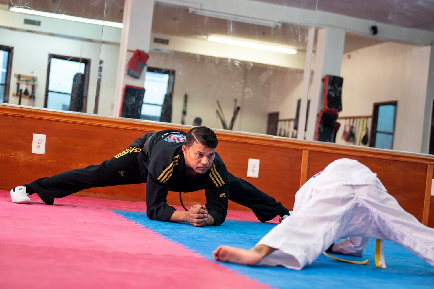 a person doing a plank on a mat