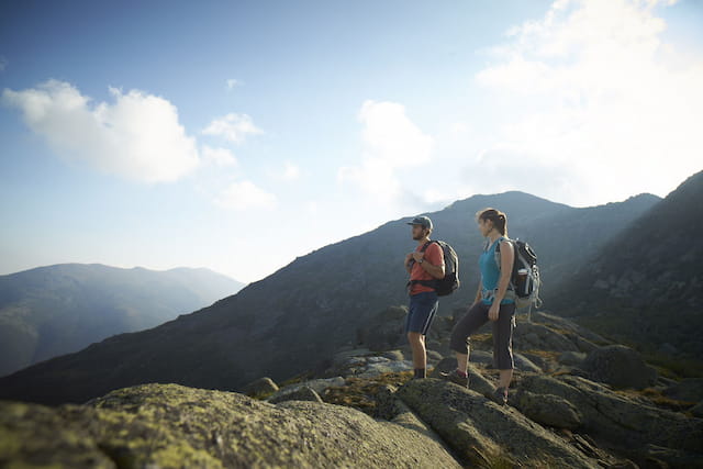 a man and woman hiking