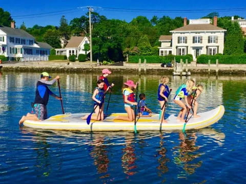 a group of people on a canoe