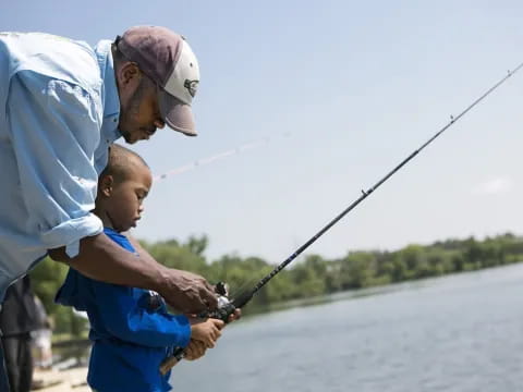 a man and a boy fishing