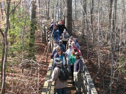 a group of people on a bridge