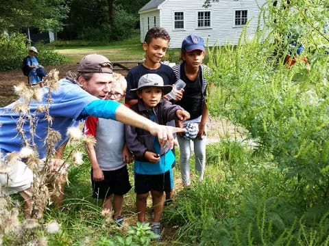 a group of people in a garden