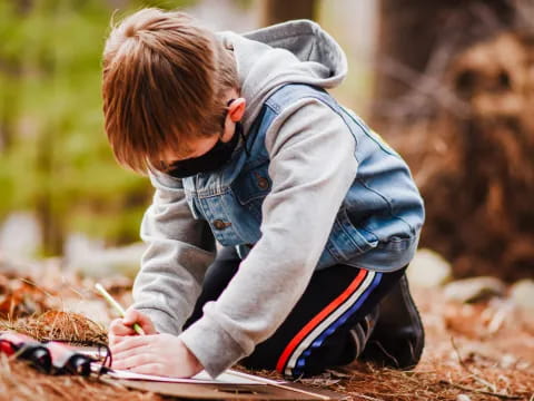 a child sitting on the ground