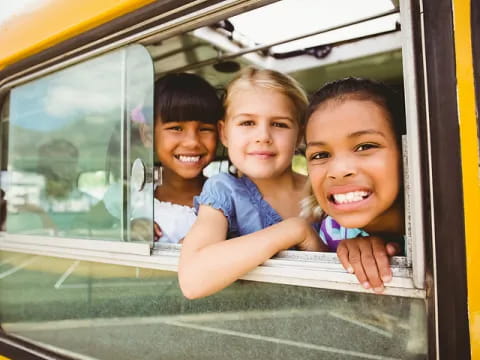 a group of kids smiling