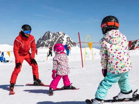 a group of kids skiing