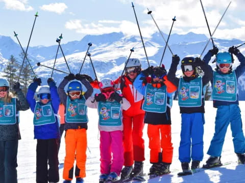a group of people wearing ski gear