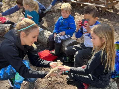 a group of children playing with toys