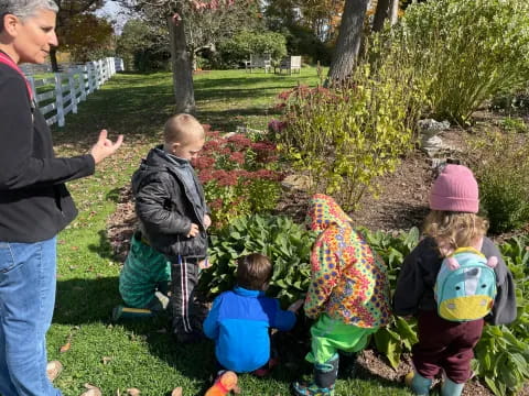 a group of people in a garden