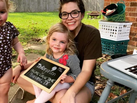 a person holding a child