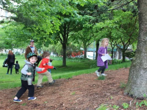 a group of children playing in a park
