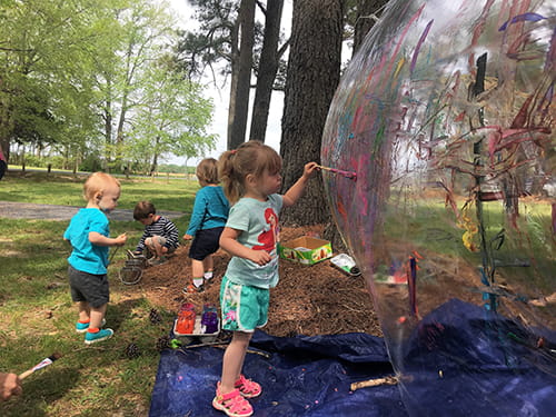 a group of children playing outside