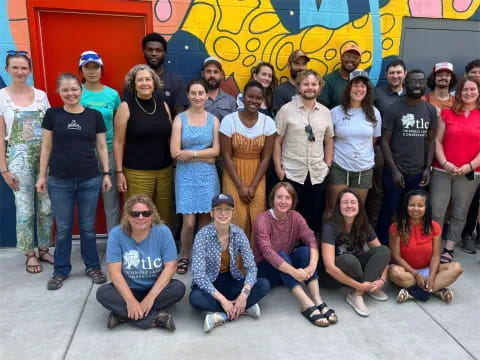 a group of people posing for a photo