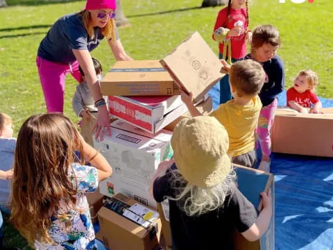 a group of children with boxes