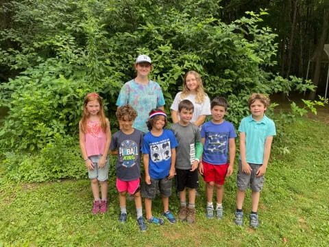 a group of children posing for a photo