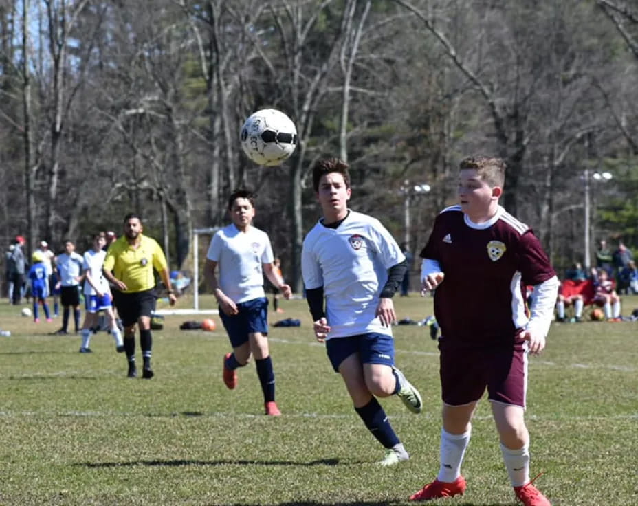 a group of men playing football