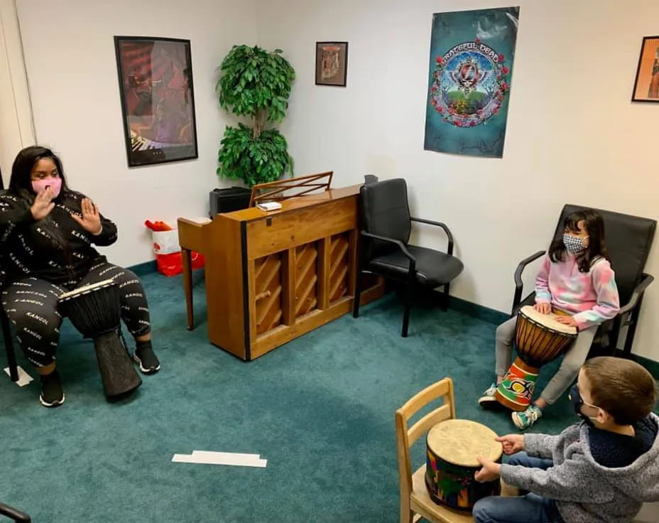 a group of people sitting in chairs