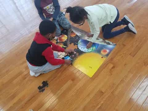 a group of kids playing with toys