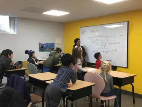 a group of people in a classroom