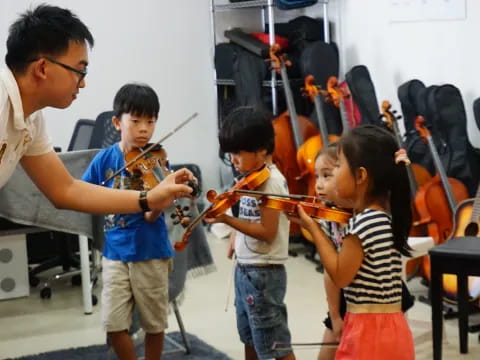 a person and a group of kids playing instruments