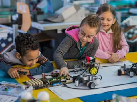 a group of children playing with toys