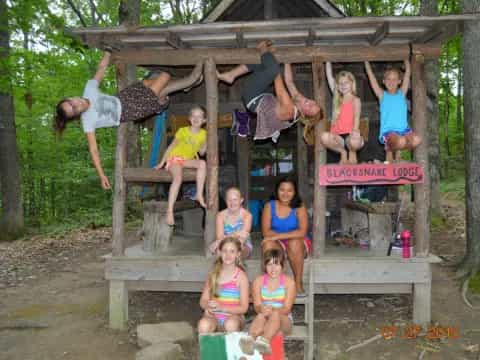 a group of people in a tree house