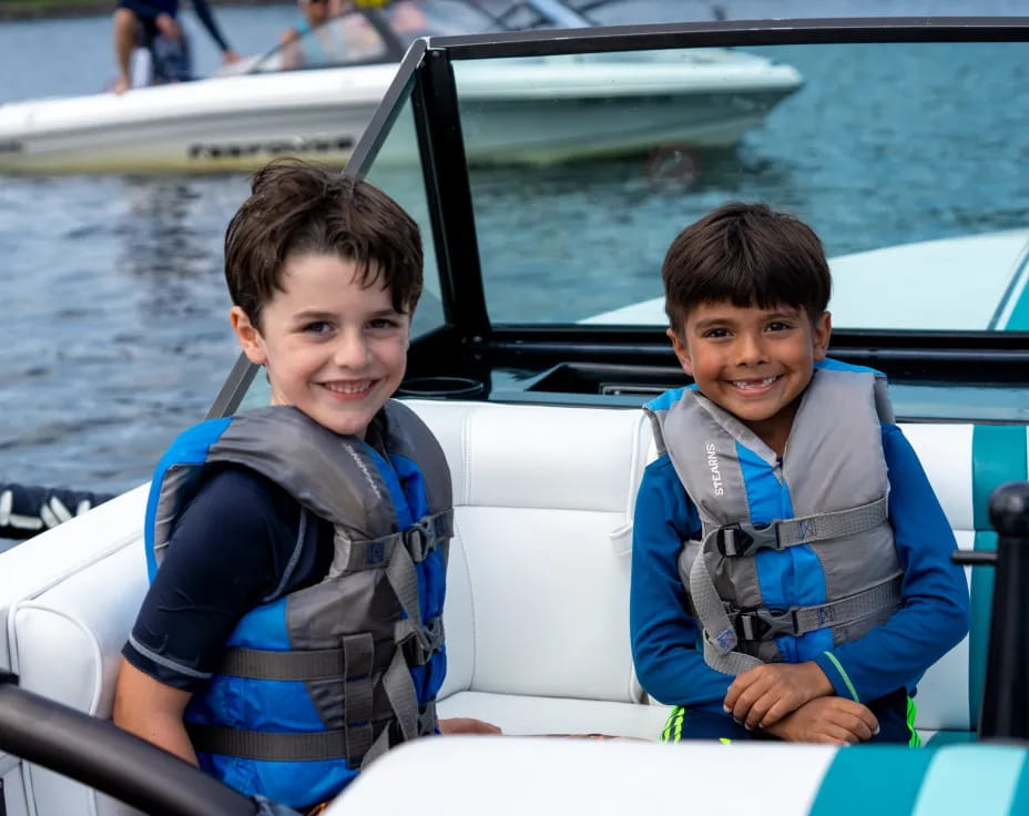 two boys in a boat