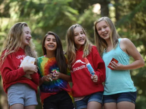 a group of girls smiling