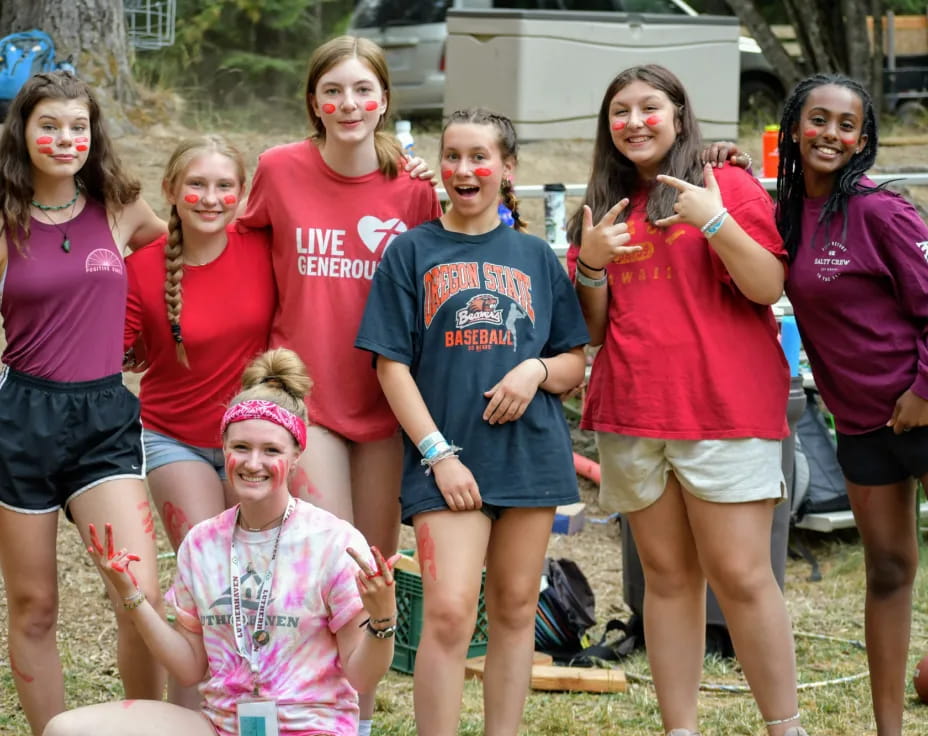 a group of people posing for a photo