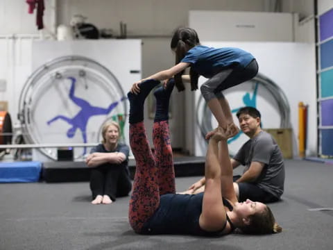 a group of people doing yoga