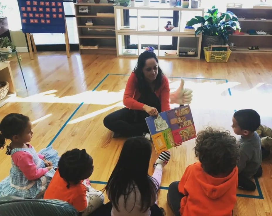 a person teaching children in a classroom