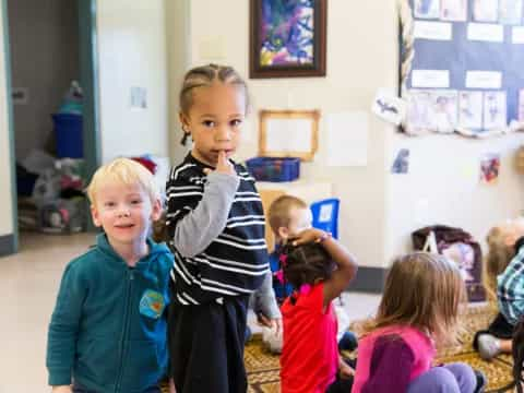 a group of children in a classroom