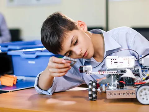 a boy with a toy train