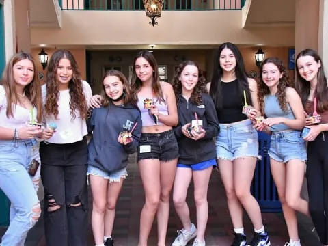 a group of women posing for a photo