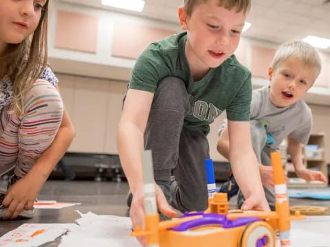 a group of children playing with toys