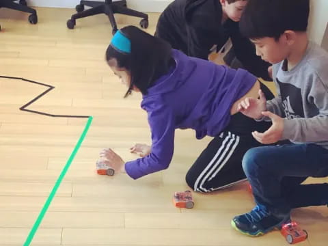 a group of people playing with toys