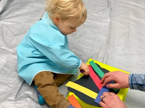 a child playing with a toy