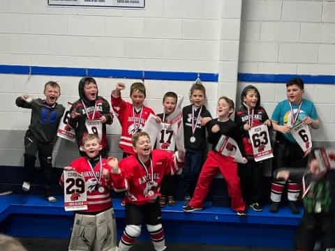 a group of people in hockey uniforms